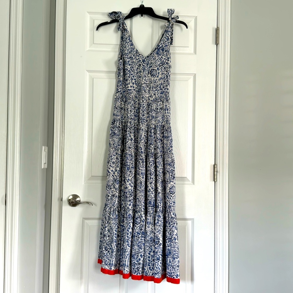 Like New-light weight dress with adjustable tie straps.